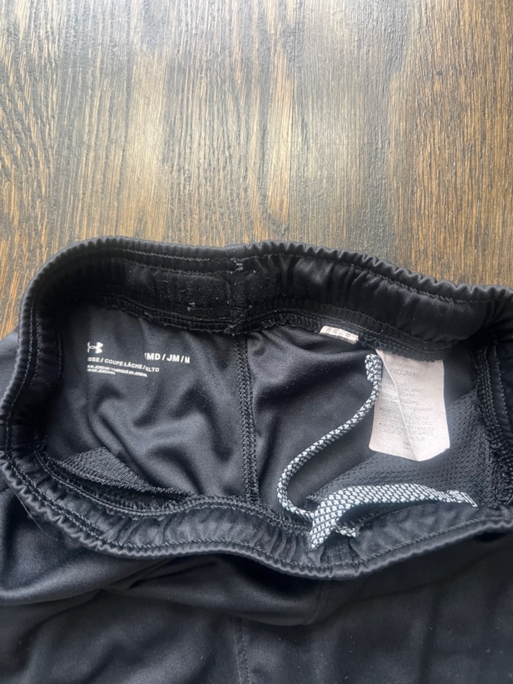 Under Armour Black Men’s Athletic Shorts with Large White Logo - Picture 2 of 4